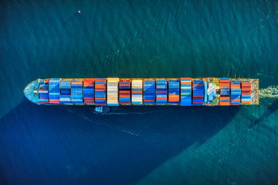 A ship carrying containers part of a supply chain
